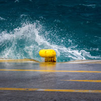 Storm at the harbor Aegina harbor, stormy sea, Mediterranean atmosphere, dramatic clouds, Greek coastline, moody seascape