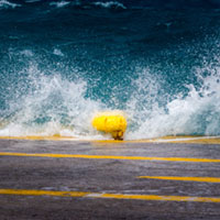 Storm at the harbor Aegina harbor, stormy sea, Mediterranean atmosphere, dramatic clouds, Greek coastline, moody seascape