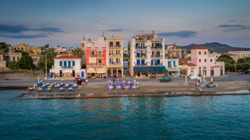 The Unique Colors of Avra Aegina, Aegina port, Avra, Greece, aerial, architecture, coastal town, coastline, colorful houses, drone, harbor, sea, travel, waterfront