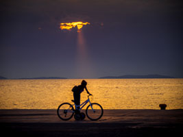 Cyclist in Golden Dusk Aegina, Greece, cyclist, evening, horizon, lifestyle, minimalism, sea, silhouette, sunset